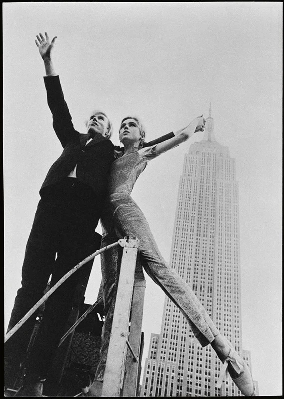 Edie Sedgwick and Andy Warhol in front of the Empire State Building, 1965